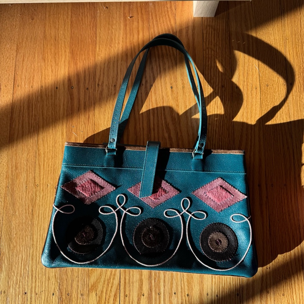Jamin Peuch Artistic Blue and Pink Shoulder Bag with Swirl Patterns